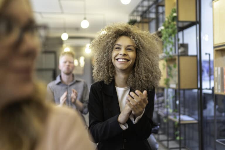 Young business people are applauding their employer.