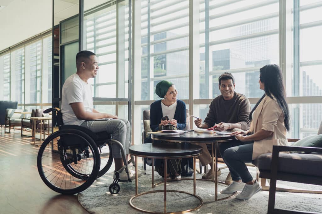 Young business people are talking in an office.