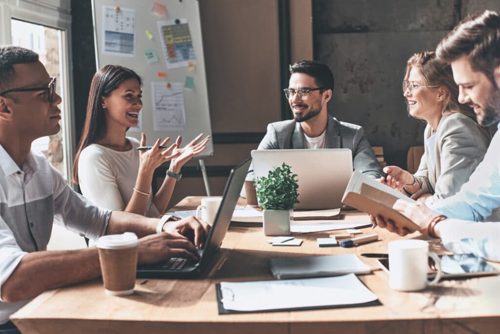 Young business people are talking in a meeting.