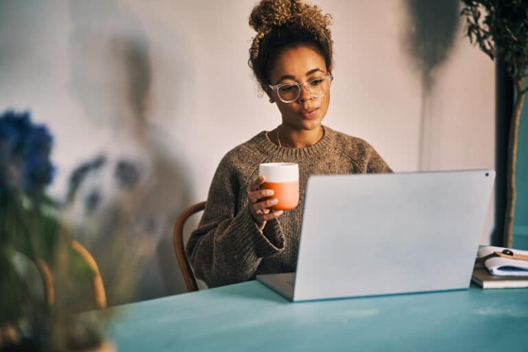 woman with coffee learning Spanish for business