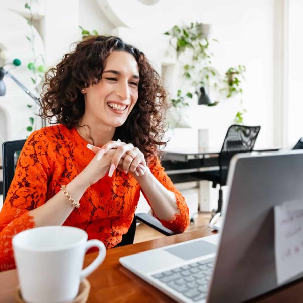 Smiling business woman is learning a new language